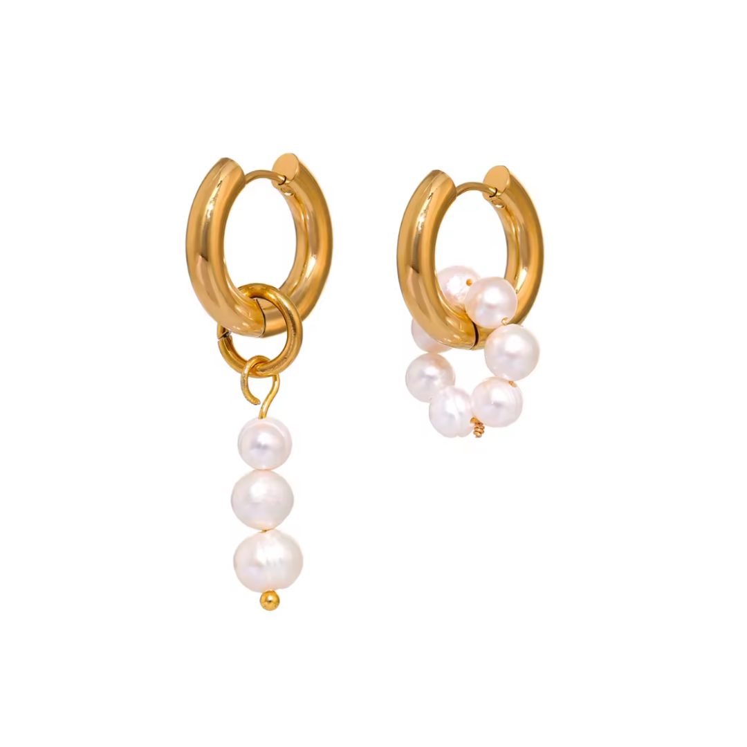 Gold hoop earrings with detachable freshwater pearls in an asymmetrical design. Elegant and versatile.